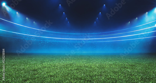 Fotografia Digital Football stadium view illuminated by blue spotlights and empty green grass field