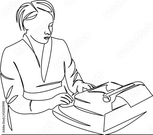 woman typing on a typewriter