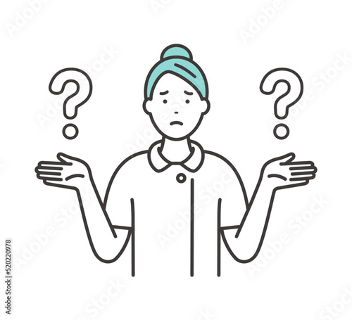 比較する若い女性看護師　選択に悩む表情