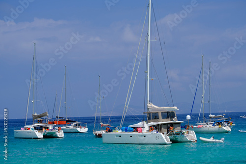 enbarcaciones fondeadas frente Sa Sequi, Sa Savina , Parque natural de ses Salines de Ibiza y Formentera, Formentera, balearic islands, Spain photo
