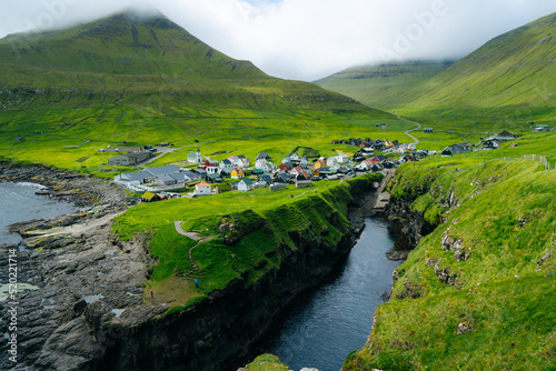 Gjógv gorge harbour, Faroe islands, Denmark, Europe : One of the most iconic place in the Faroe islands. 