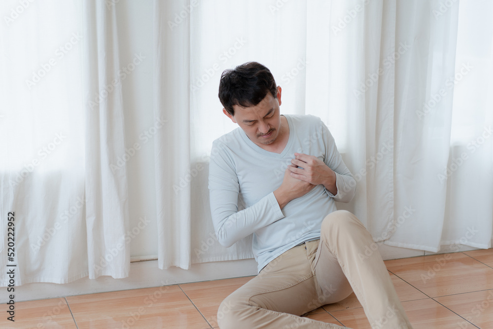 a man touching his heart, with red highlight of heart attack, and others heart disease concept, Heart attack symptom. a man touching his heart, with red highlight of heart attack, and others heart disease concept, Heart attack symptom.