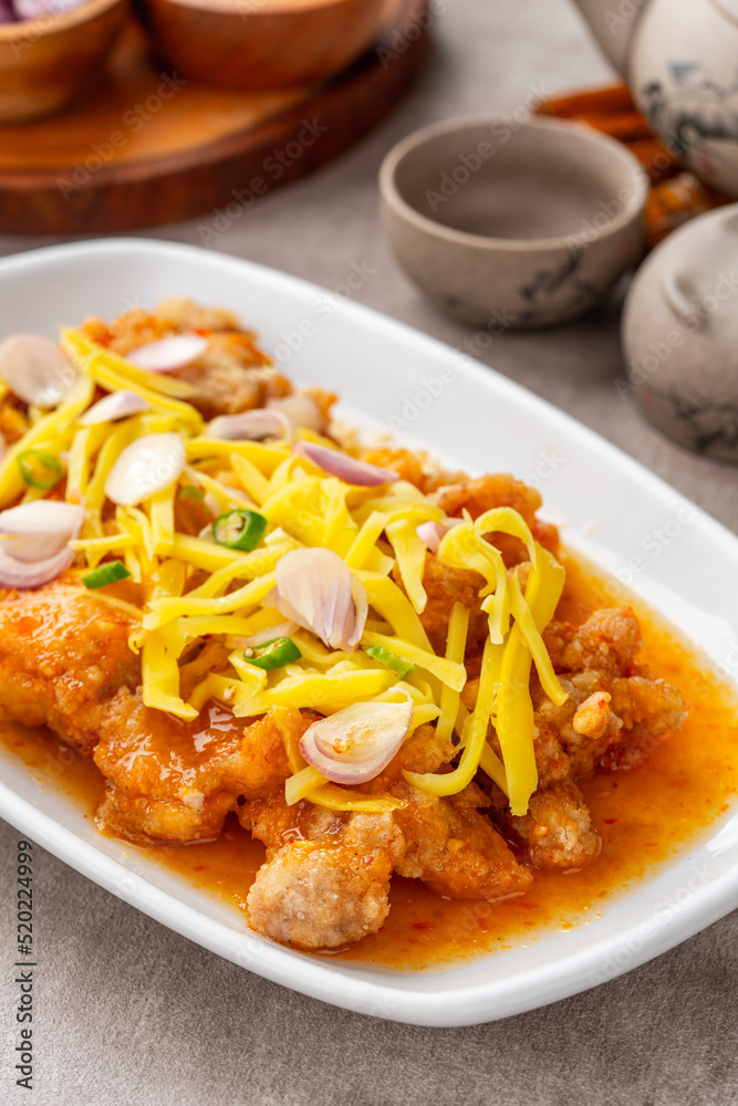 crispy chicken with mango sauce or Ayam Saus Mangga. The taste is savory spicy and a little sweet. crispy chicken with mango sauce or Ayam Saus Mangga. The taste is savory spicy and a little sweet.