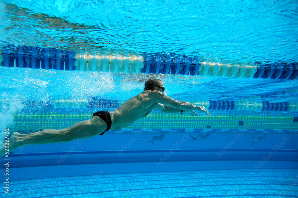 Underwater shooting of a swimmer in a swimming pool