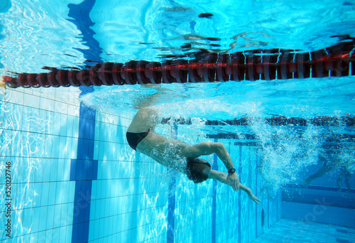Underwater shooting of a swimmer in a swimming pool
