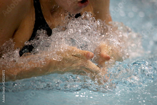 Woman Swims the Breaststroke