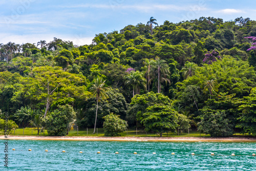 Beach with trees in the Ilha Grande, Angra dos Reis town, State of Rio de Janeiro, Brazil. Taken with Nikon D7100 18-200 lens, at 36mm, 1/200 f 20.0 ISO 800. Date: Feb 10, 2016