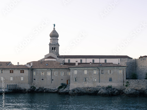 Coastal town Krk on island Krk, Croatia, bayside Frankopan fortress and bell tower
