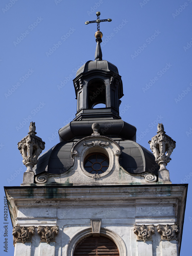 A small beautiful tower on the Cathedral of St. George in Lviv, Ukraine. Baroque architecture. Clear sky. A small beautiful tower on the Cathedral of St. George in Lviv, Ukraine. Baroque architecture. Clear sky.
