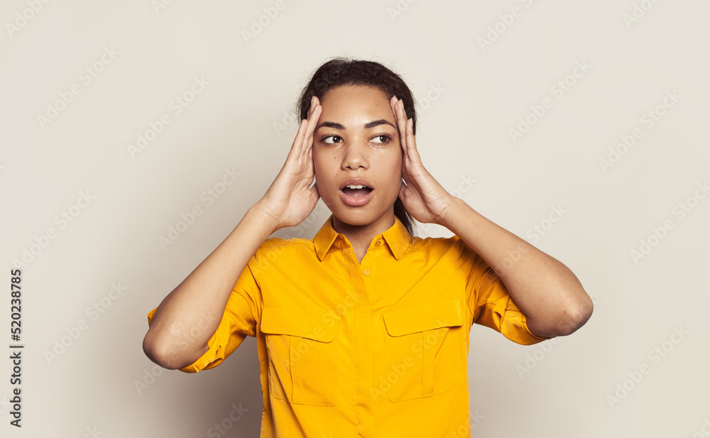 Surprised woman touching herself head on white background Surprised woman touching herself head on white background