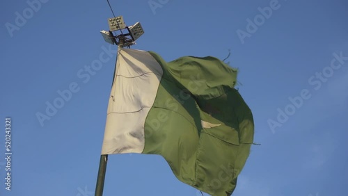 Old Pakistan flag waving. recorded in slow motion.