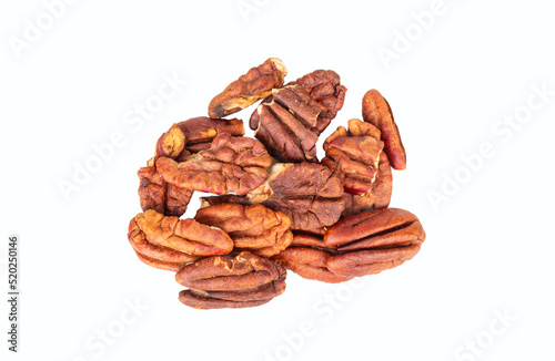 Small pile of dry pecan halves without shell isolated on white background, top view