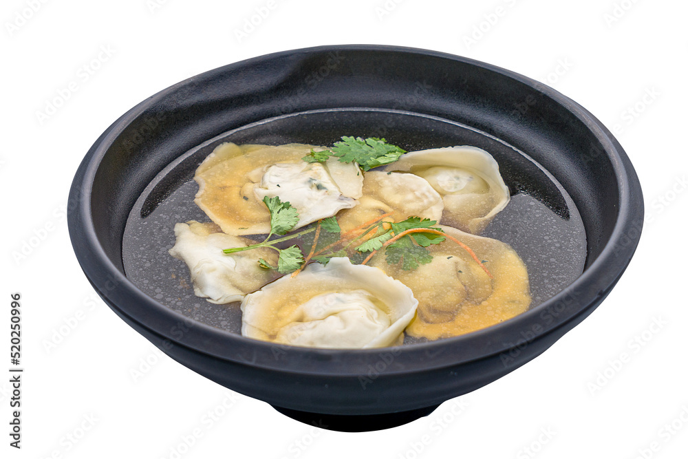 Handmade dumpling soup served in bowl isolated on white background side view