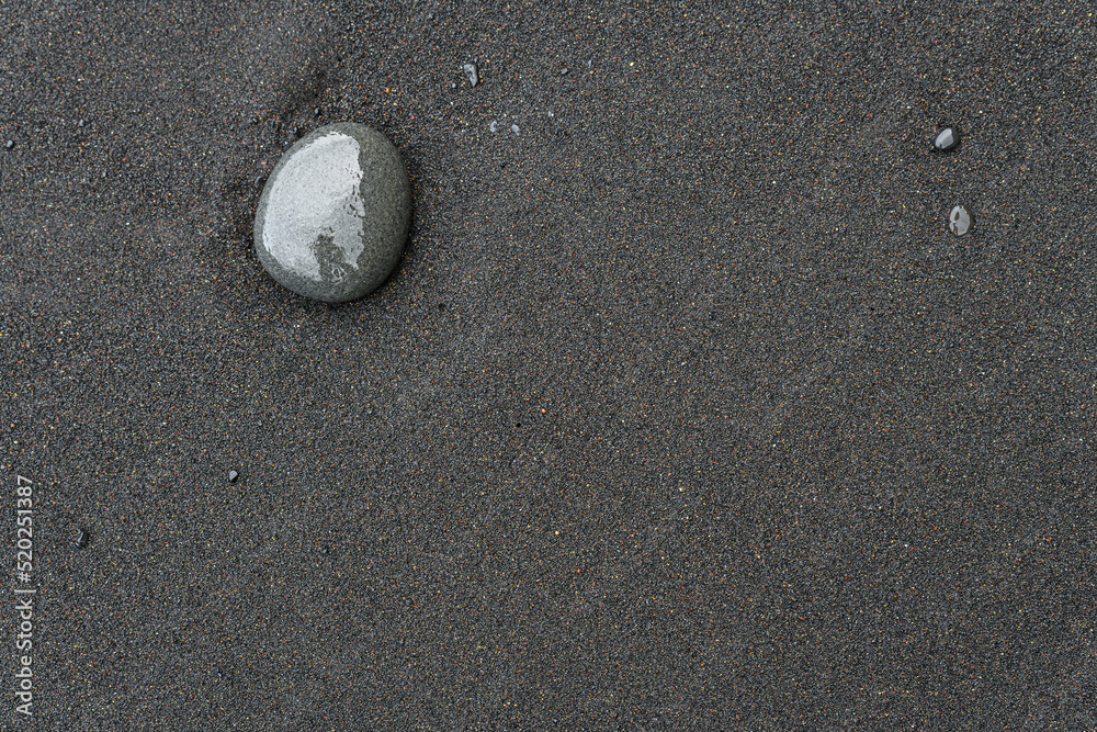 Icelandic black sand. Background, pattern, volcanic black sea sand. Icelandic black sand. Background, pattern, volcanic black sea sand.