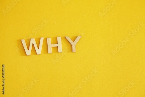 Why Letters on a yellow background photo