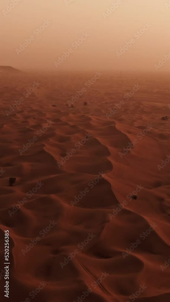 Vertical panning from a quadcopter. Sand dunes in the desert in Dubai, UAE Vertical panning from a quadcopter. Sand dunes in the desert in Dubai, UAE