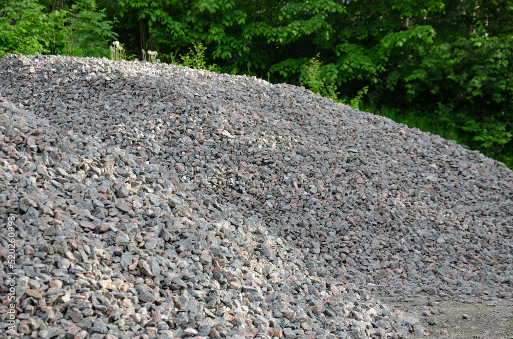 pile of gravel spilled on the road, construction concept pile of gravel spilled on the road, construction concept