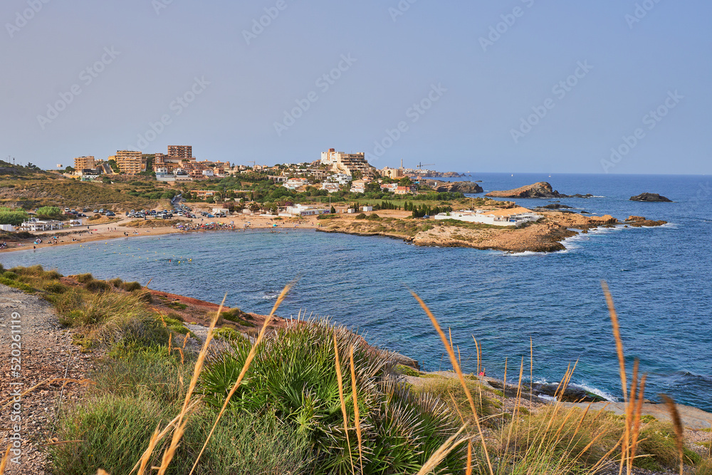 View in the distance of the Cala Reona, in the background the cabo de palos, from the mountains of Calblanque in Murcia, Spain
