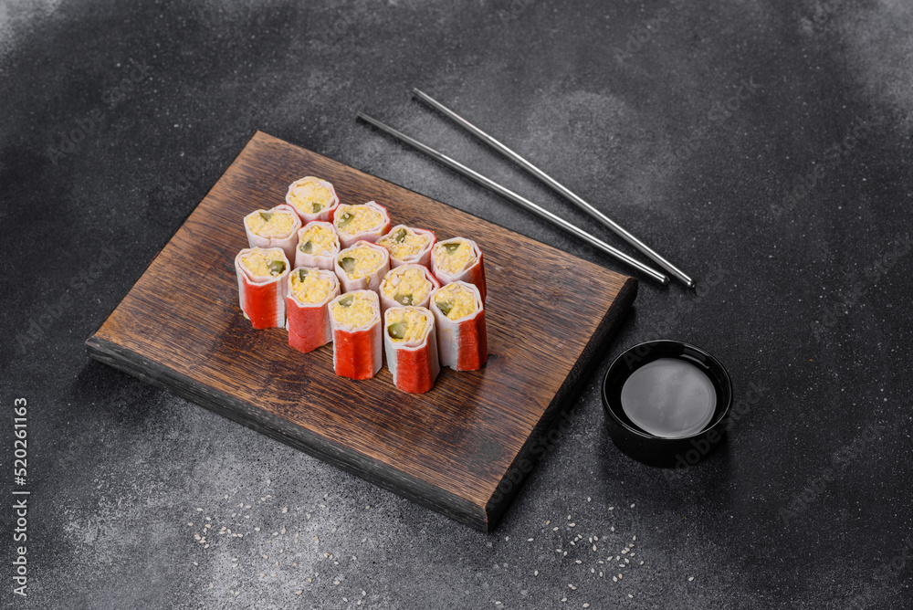 Crab sticks stuffed with rice, egg and green onions Crab sticks stuffed with rice, egg and green onions