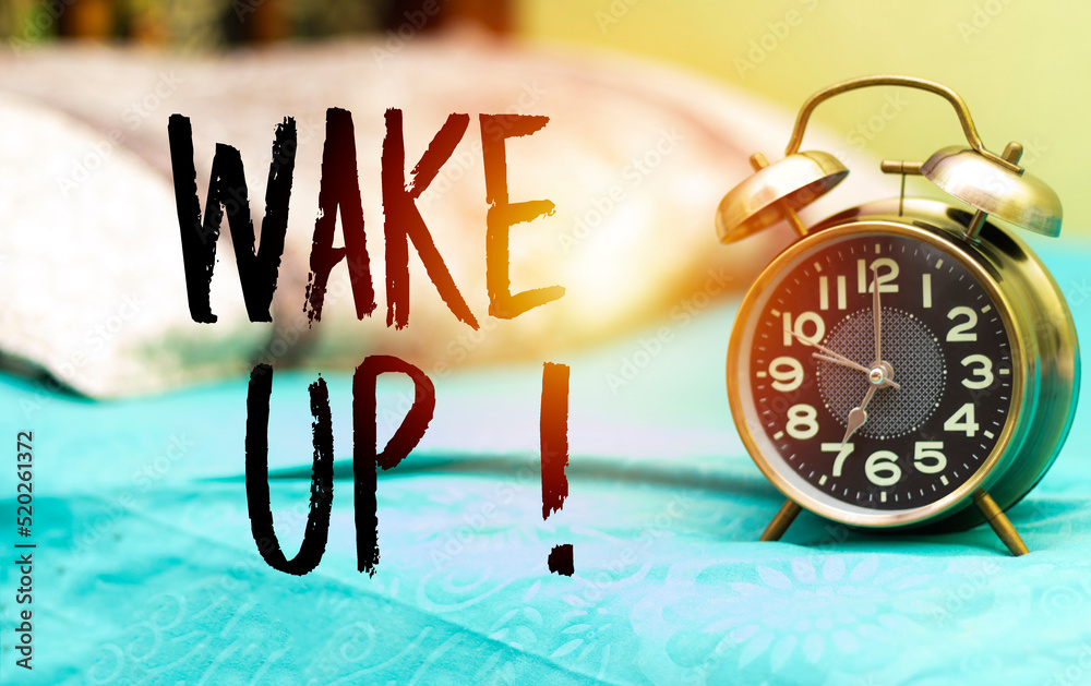 alarm 7 o' Clock above alarm showing 7 o' Clock above bed with wake up