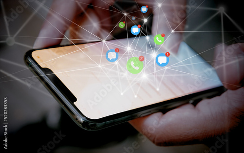 Wallpaper Mural connection and communication notifications on a smartphone, illustrated with grid with different notifications as a hologram above the smartphone, phone, mail, chat Torontodigital.ca