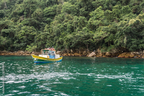 Boat at the coast of Ilha Grande, Angra dos Reis town, State of Rio de Janeiro, Brazil. Taken with Sony ILCE 6000 16-5 lens, at 28mm, 1/60 f 5.6 ISO 100. Date: Dec 30, 2021 photo