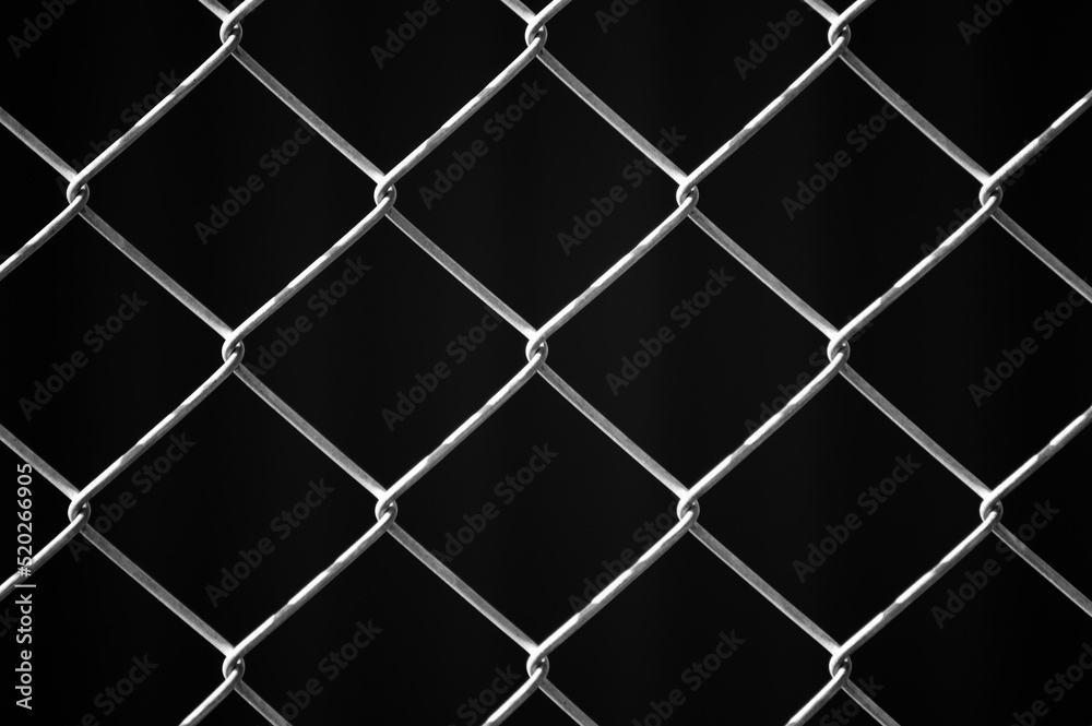 metal mesh,in the photo a mesh on a gray background metal mesh,in the photo a mesh on a gray background