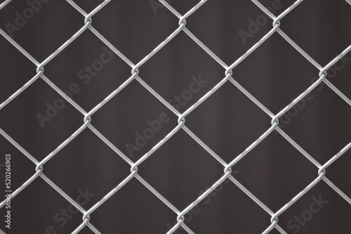 metal mesh in the photo a mesh on a gray background