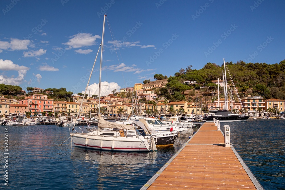 Porto Azzurro, Island of Elba, Italy - 19 September 2021 Colorful cityscape of Harbor of Porto Azzurro 