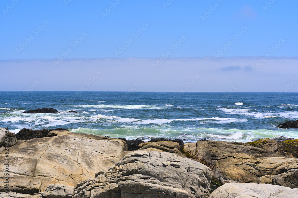 waves and rocks, rocky coast in Valparaiso, Chile 