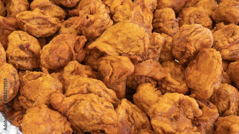 Lot of crispy breaded chicken fillet for sale at street vendor Lot of crispy breaded chicken fillet for sale at street vendor