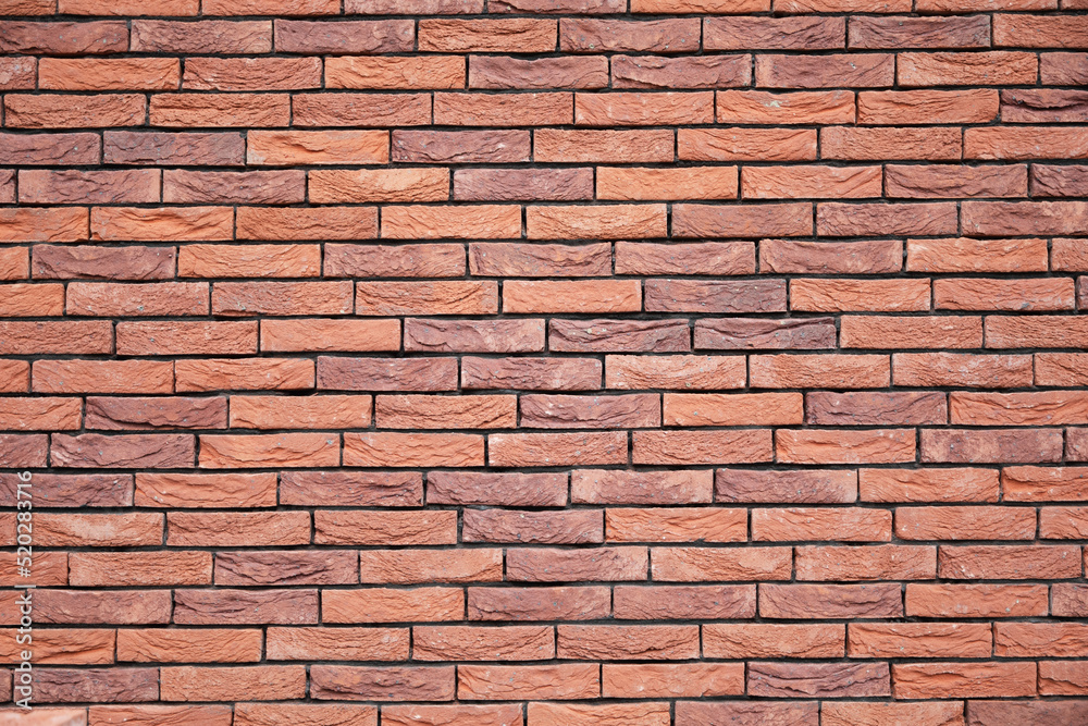 a new House is being built, the beginning of brickwork with red bricks, building a new House is being built, the beginning of brickwork with red bricks, building