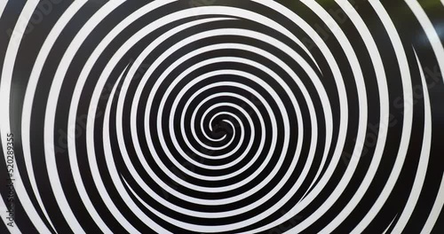 Moving hypnotic spiral, optical illusion