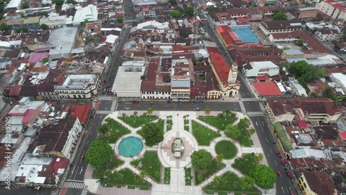 Aerial 4k video of Iquitos, Peru, and its Plaza de Aramas.  The city is also known as the Capital of the Peruvian Amazon.  It is the largest city in the world that is not reachable by road.