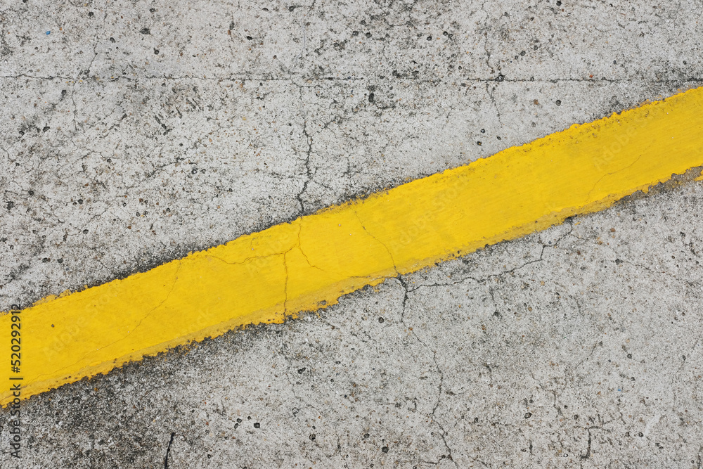 Fototapeta premium the yellow line on asphalt
