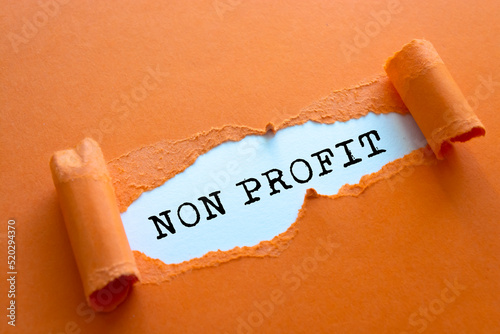 Text sign showing Non profit
