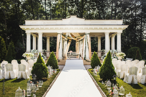 Outdoor wedding ceremony in a green garden