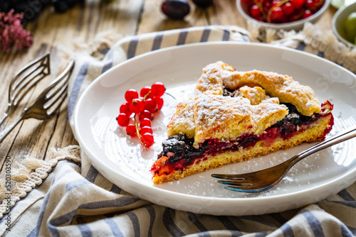 Fruit cake on wooden table 