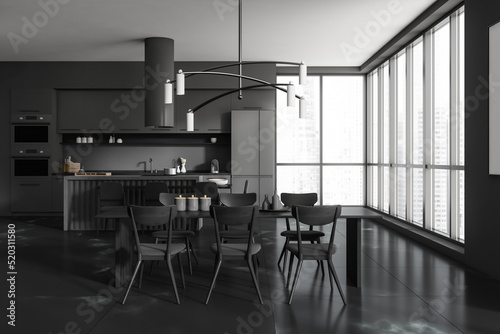 Front view on dark kitchen room interior with island, barstools