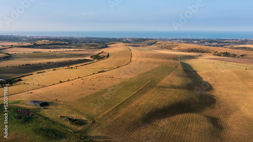 Glorious aerial drone landscape image of South Downs in English countryside on Summer morning