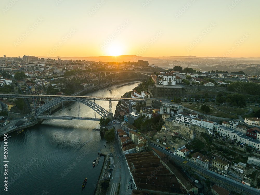 Porto Portugal Aerial View. Dom Luis Bridge at Sunrise. Porto, Portugal. Cityscape of Downtown Touristic Ribeira. Olt Town. Douro River.