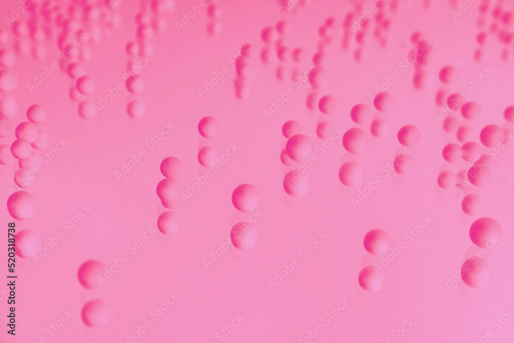 pink balls on a pink background, colored background, pink balls on a pink background, colored background,
