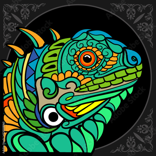 Colorful iguana head zentangle arts isolated on black background.