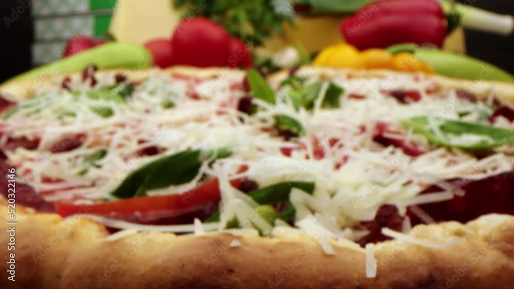 Close-up is a slice of freshly baked pizza with delicious elastic cheese. Delicious Italian pizza from the oven on a background of tomato, spices and cheese. food and drink 4k footage Close-up is a slice of freshly baked pizza with delicious elastic cheese. Delicious Italian pizza from the oven on a background of tomato, spices and cheese. food and drink 4k footage