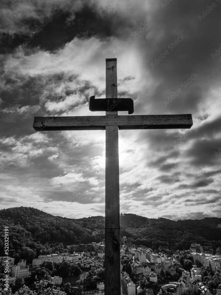Christian Cross on Peter's Height Lookout or Petrova Vysina in Karlovy Vary, Bohemia, Czech Republic in Dramatic Black and White Christian Cross on Peter's Height Lookout or Petrova Vysina in Karlovy Vary, Bohemia, Czech Republic in Dramatic Black and White