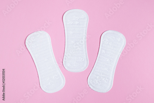 Daily women's gasket on pink background. Woman hygiene protection