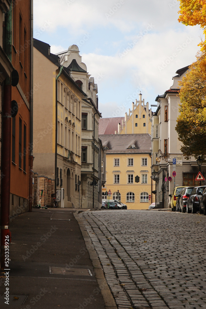 Old paved street in the center of Augsburg, Germany