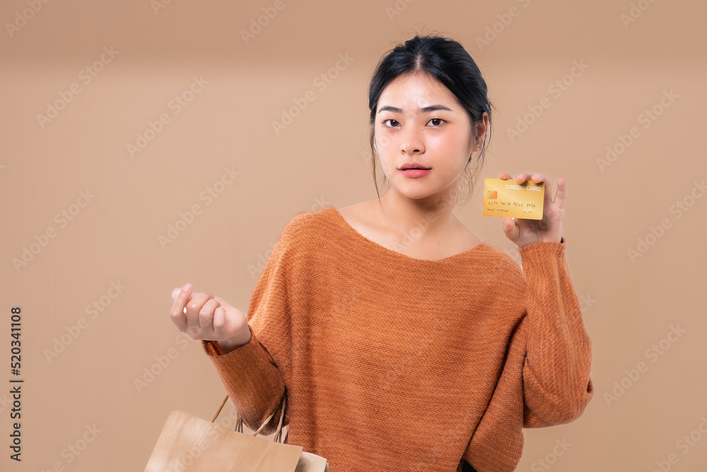 Happy Asian woman holding package parcel box isolated on background. Delivery courier and shipping Happy Asian woman holding package parcel box isolated on background. Delivery courier and shipping