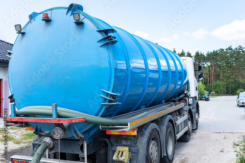 A truck with a large tank for pumping out a septic tank with a capacity of more than 20 cubic meters.