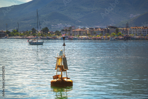 Solar-powered buoy marks the navigable fairway in the harbor